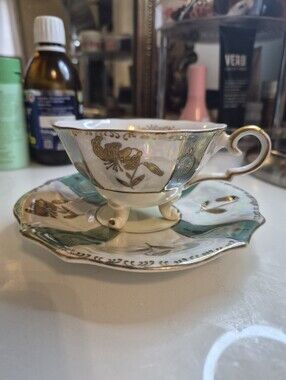 Ucagco Footed Tea Cup & Saucer